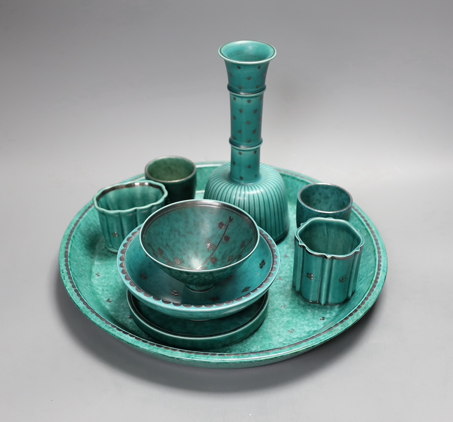 A group of Gustavsberg Wilhelm Kåge design Argenta wares including a tray and two floral decorated pieces; pattern no’s. 960, 1113, 510, A26, A19, 1003, 1094, 1512, 1017